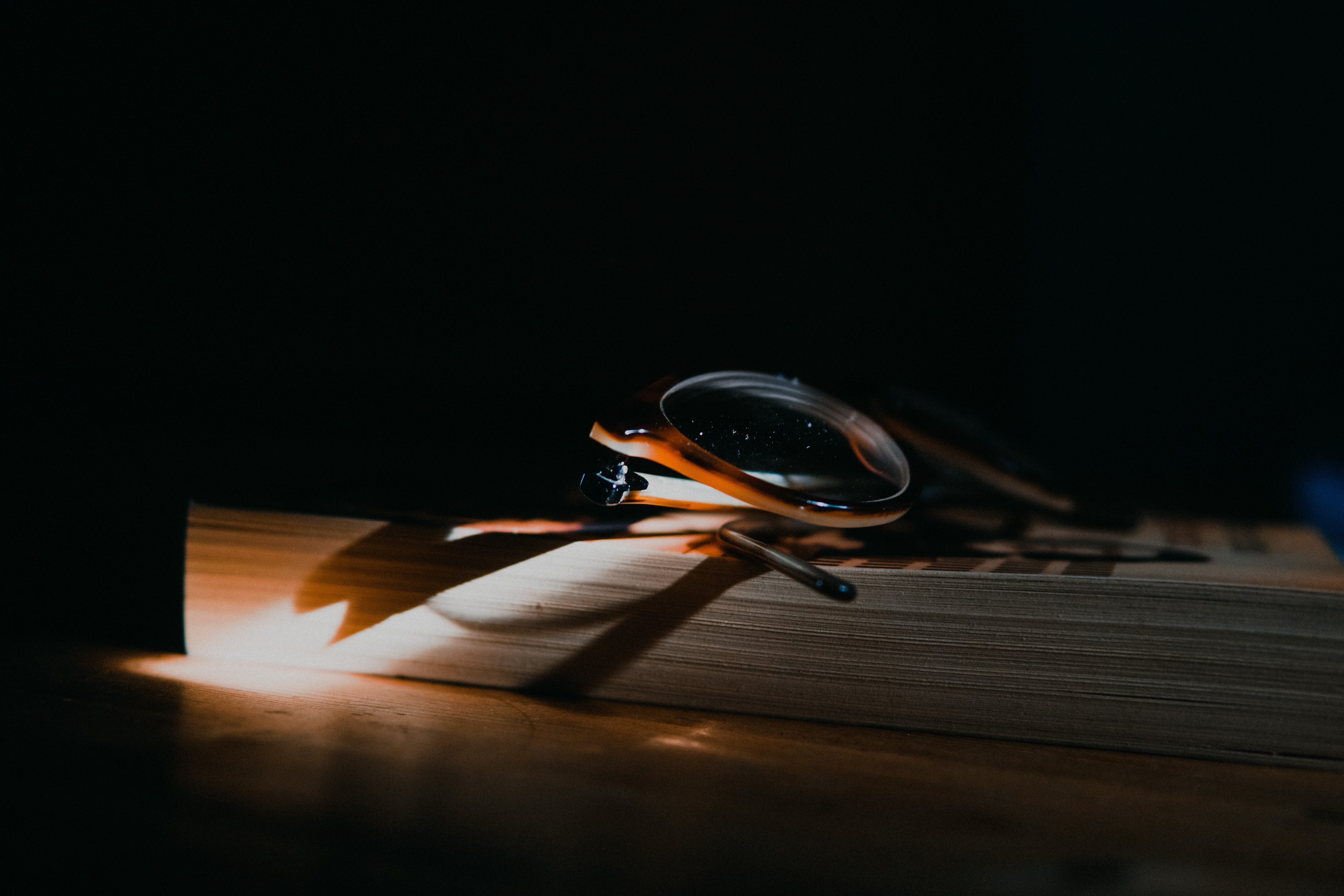 Glasses on top of a book